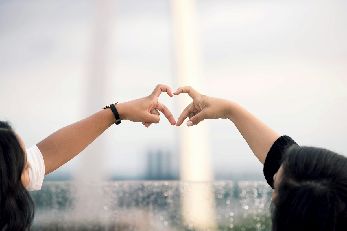Hands forming a heart shape