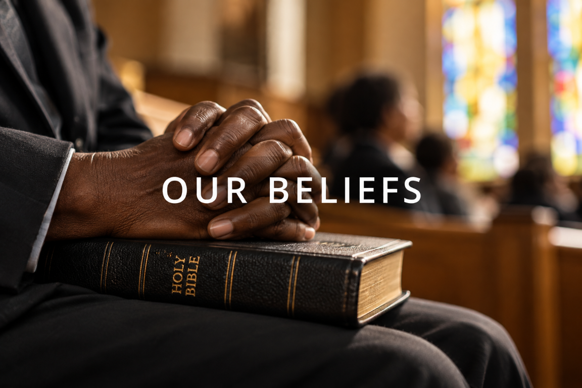 Hands resting on Holy Bible in prayer
